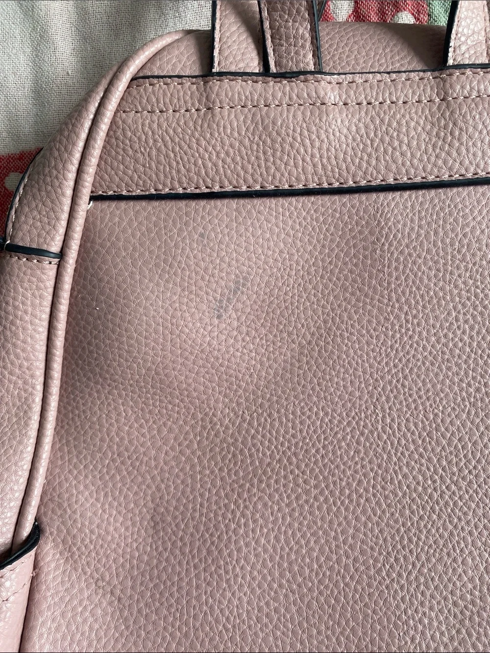 Blush Pink Mini Backpack with Gold Hardware and Striped Lining.